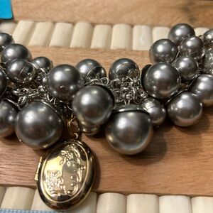 Handmade:  Elegant Silver Beaded purse charm with Gold colored locket